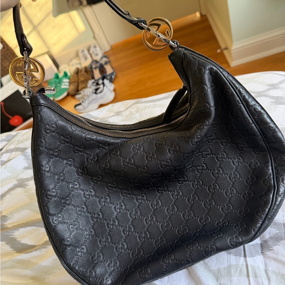 Gucci Black Embossed Hobo Bag with Gold Accents